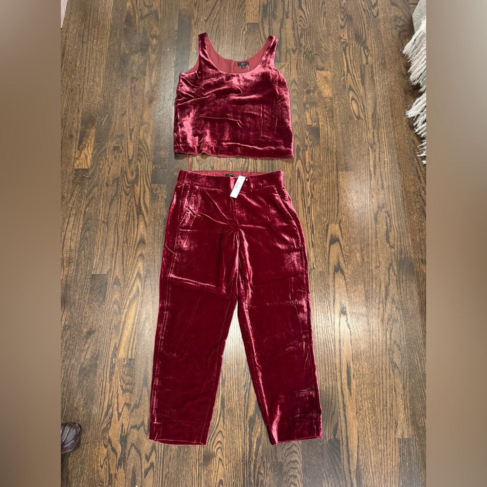 Maroon/burgundy velvet cropped pants.
